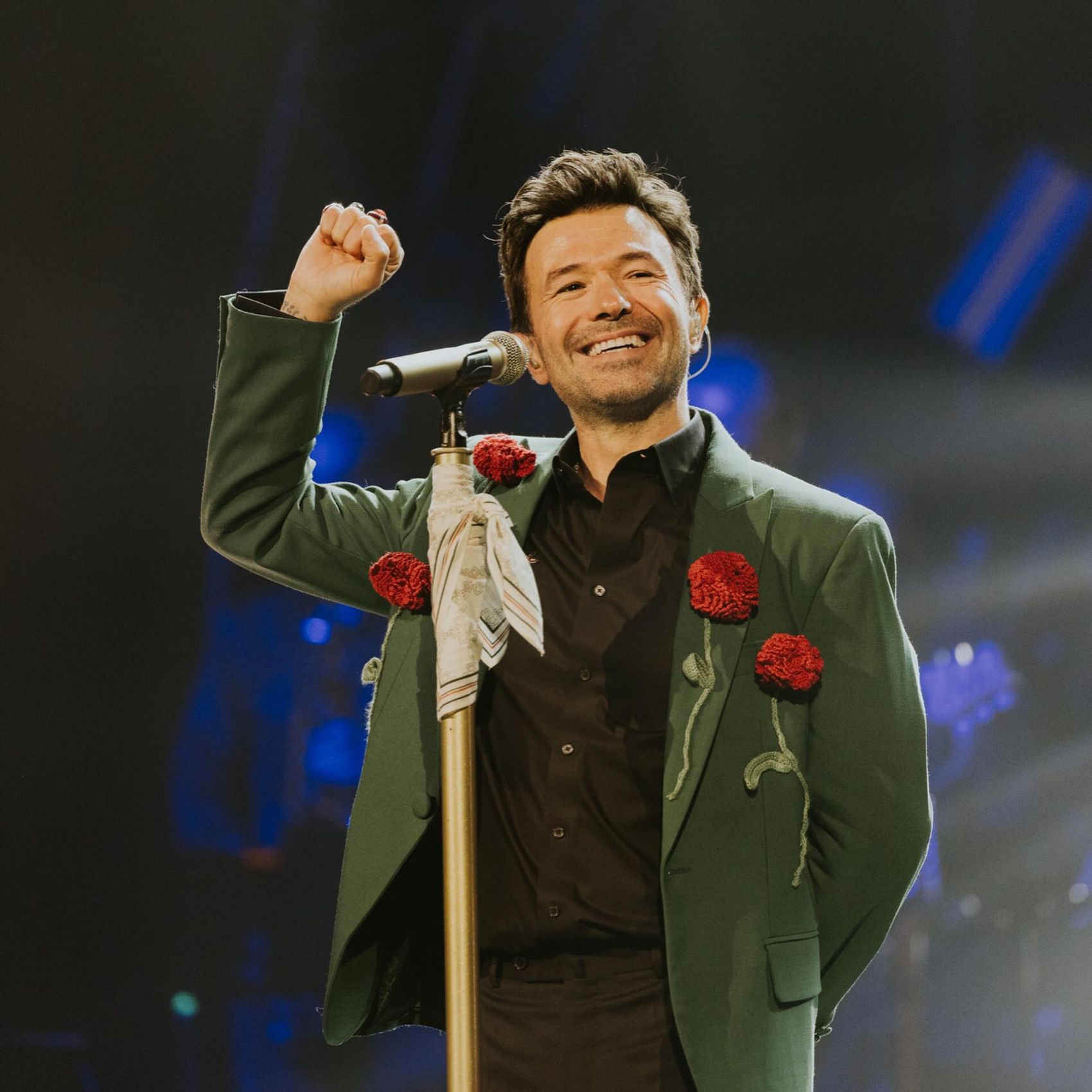 Green jacket with handmade fabric roses