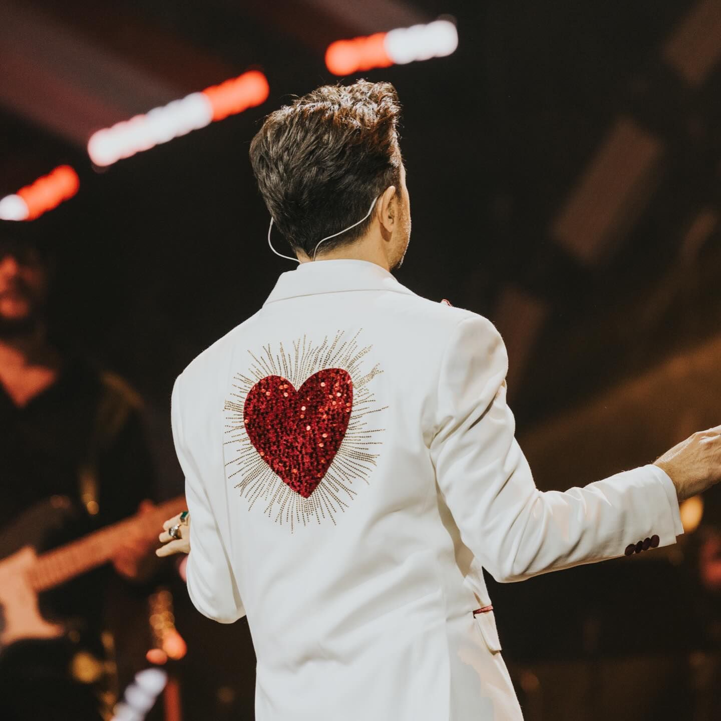 Sequin heart on the back of a white jacket